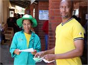 Eliphus Mathibedi (DWS official) distributing pamphlets
